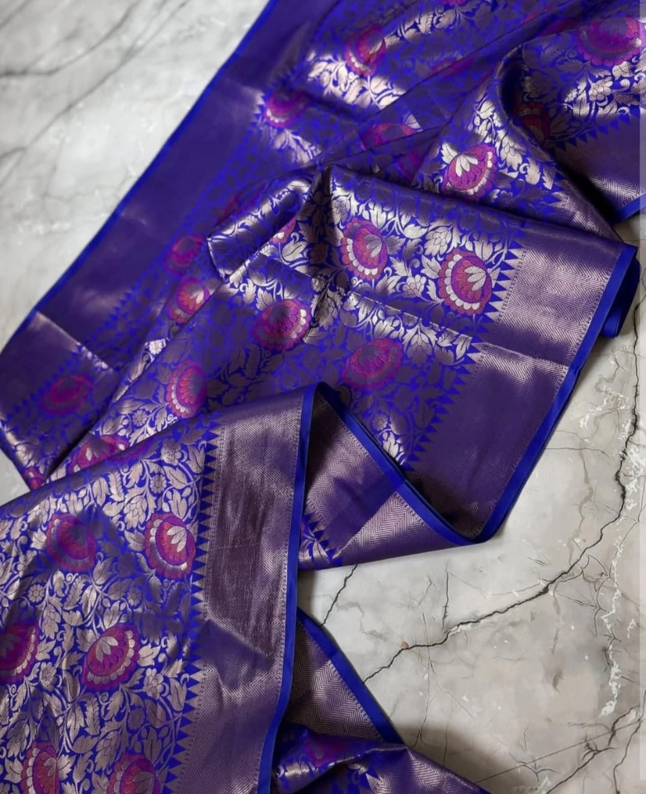 Nita Ambani Inspired Royal Blue Tissue Banarasi Saree with Pink Floral Zari Weave