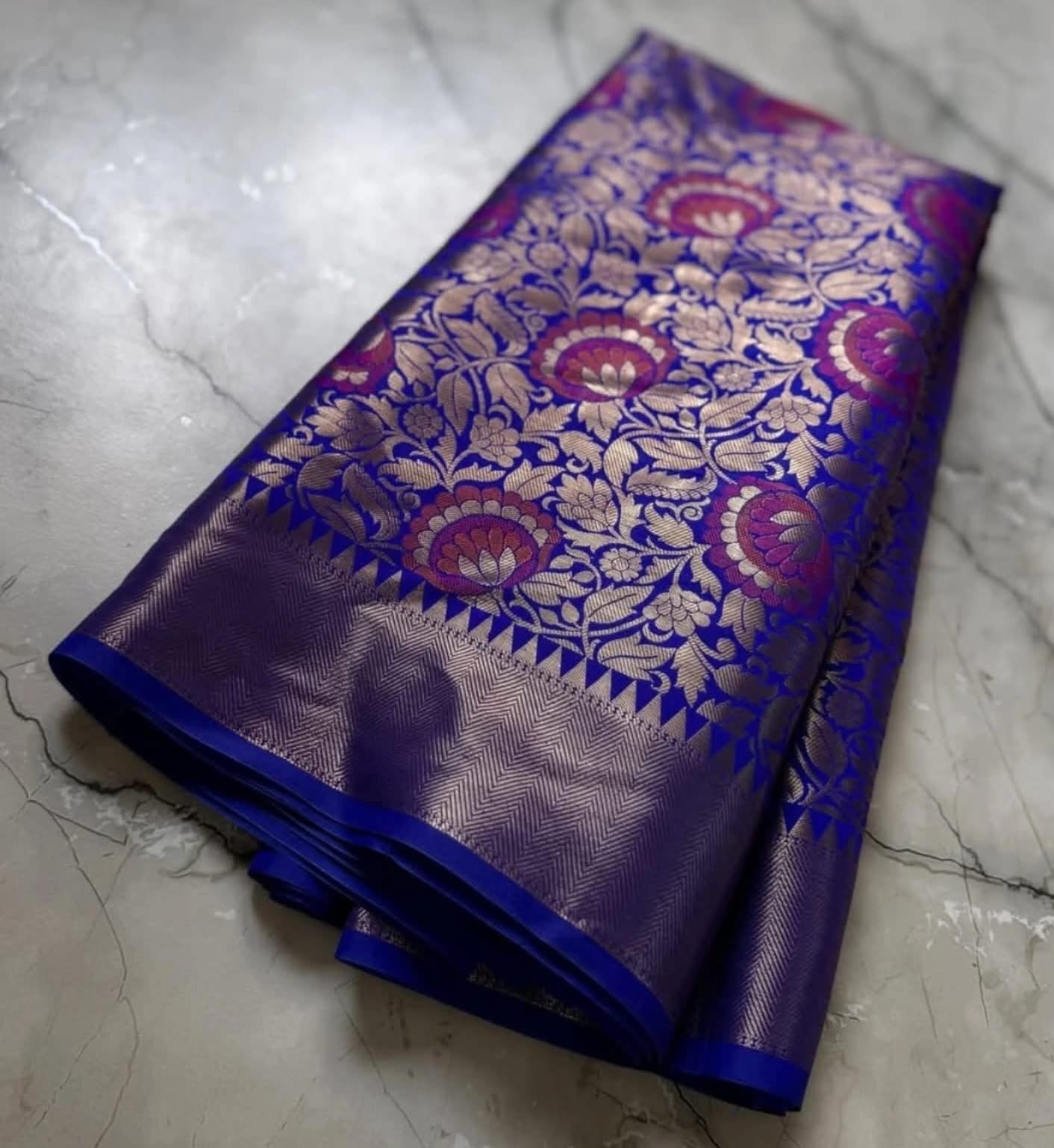 Nita Ambani Inspired Royal Blue Tissue Banarasi Saree with Pink Floral Zari Weave